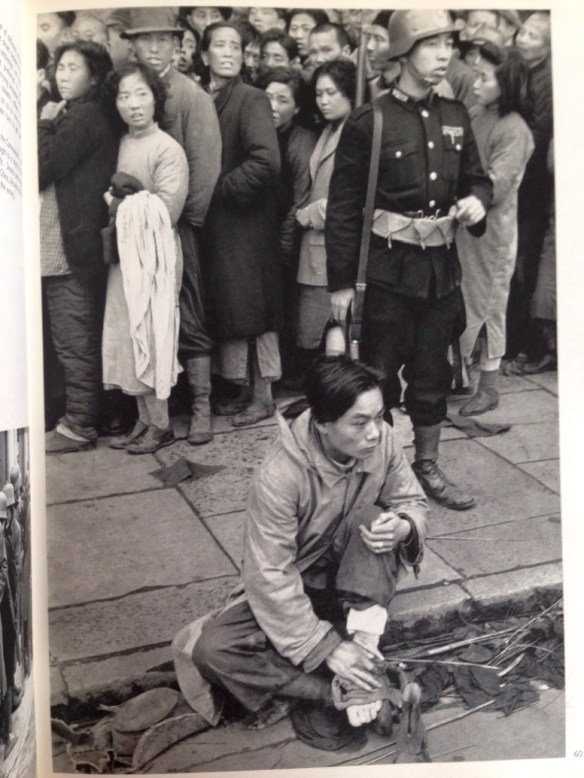 Shanghai, December 1948. The gold rush. Enormous lines form outside the banks, on the Bund, and overflow into the neighbouring streets, dislocating all traffic. About ten people were crushed to death. The Kuomintang had decided to distribute some of the gold reserve, at the rate of 112 ounces per head. Some people waited for more than twenty-four hours trying to get rid of paper money. Order was more or less maintained by soldiers equipped with odds and ends deriving from all the various armies which in the past fifteen years, have played a part in Chinese history.